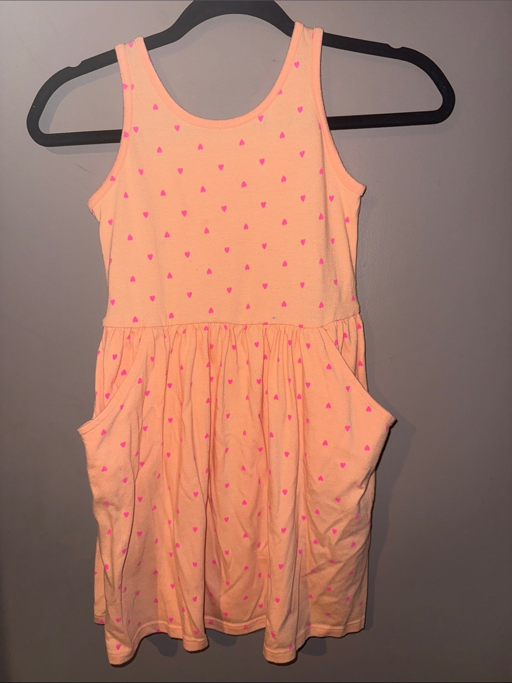 Girls Sleeveless Peach Dress with Pink Heart Print